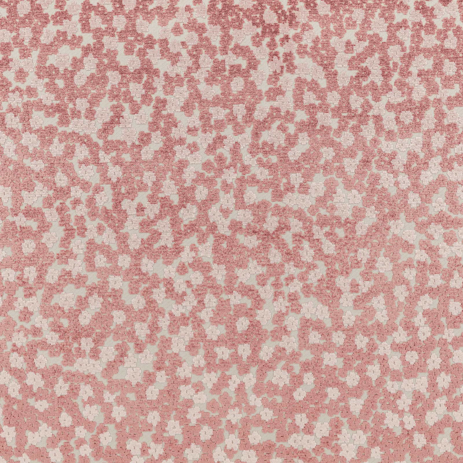 Dusty vintage-rose and cream woven textile with a softly mottled floral pattern