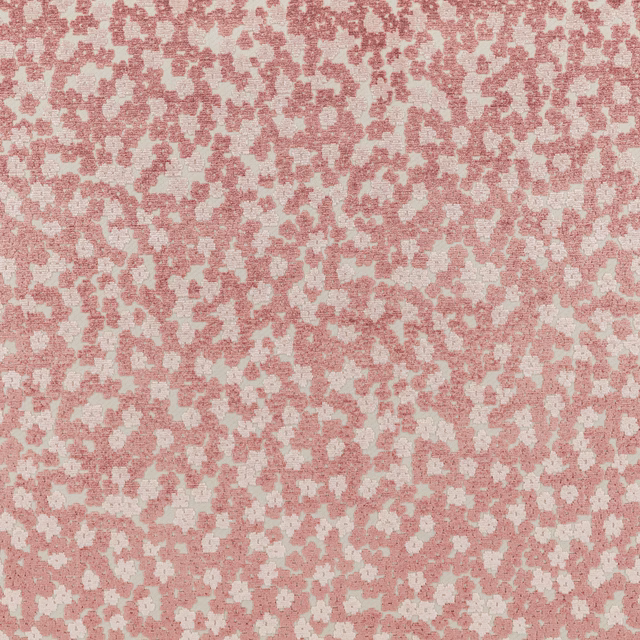Dusty vintage-rose and cream woven textile with a softly mottled floral pattern