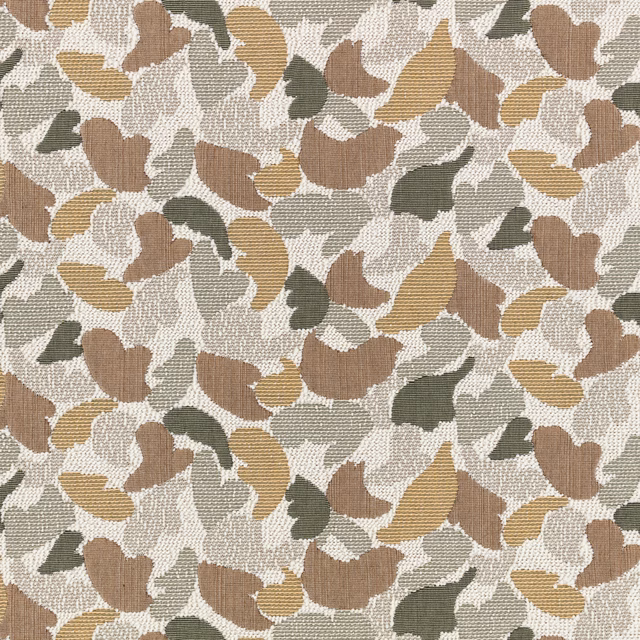 Pistachio-toned woven fabric with cream, taupe, ochre and olive abstract leaf motifs