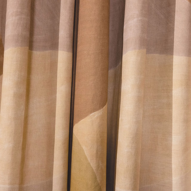Taupe and ochre geometric blocks in a softly translucent woven curtain fabric