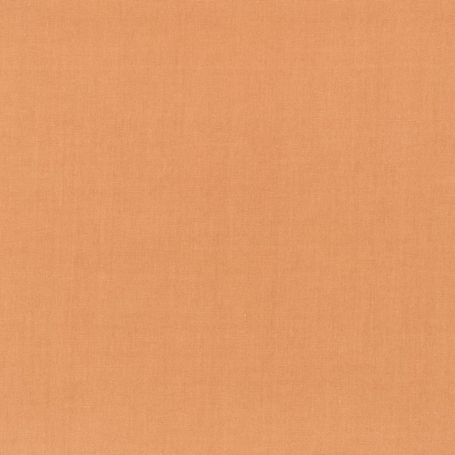 Warm amber-orange plain weave fabric with a subtle crosshatched surface texture