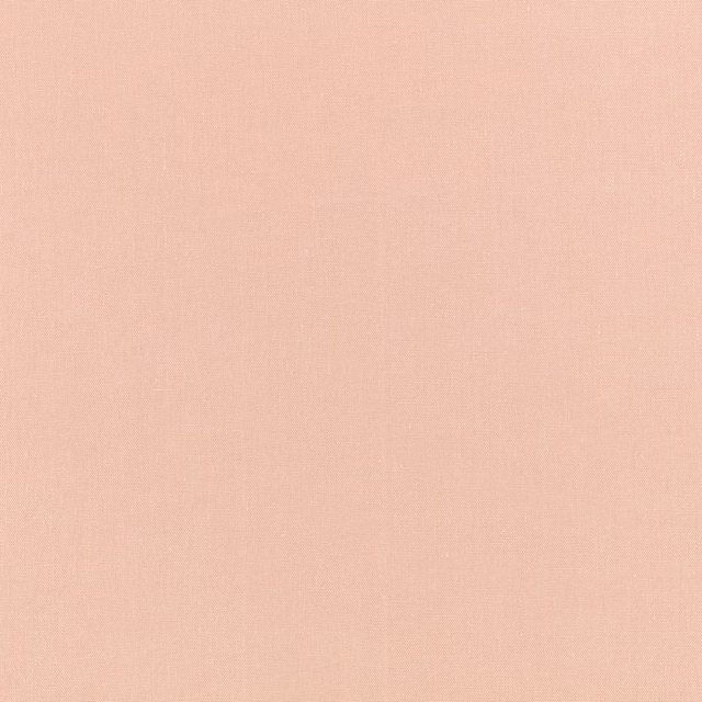 Soft peach-pink plain weave with a barely visible, even textile texture