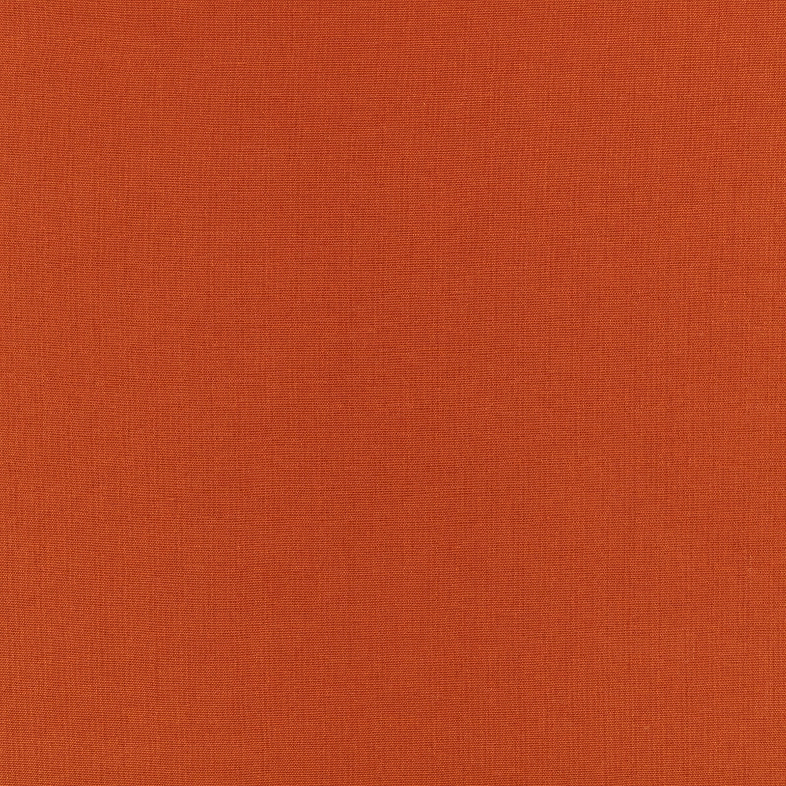 Burnt orange fabric swatch showing a fine, even plain-weave texture