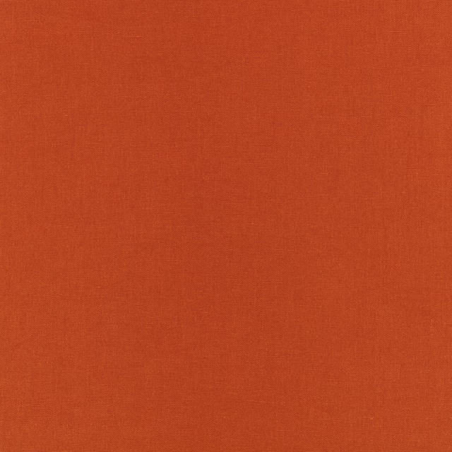 Burnt orange fabric swatch showing a fine, even plain-weave texture