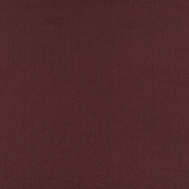 Deep fig-plum plain weave with subtle brown undertones and fine surface texture