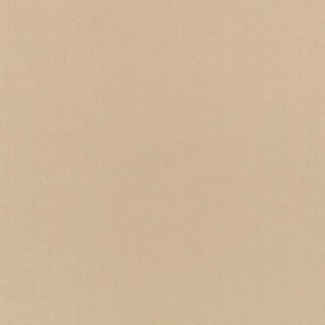 Warm flax beige fabric showing a fine, subtly varied plain weave
