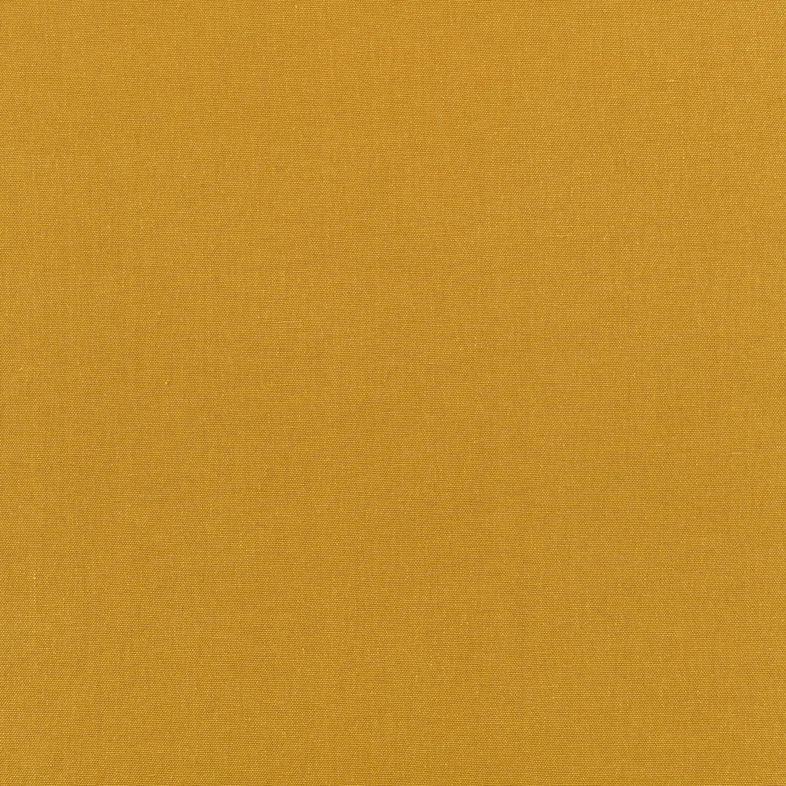 Close-up of warm ochre mustard fabric showing a fine, even plain weave
