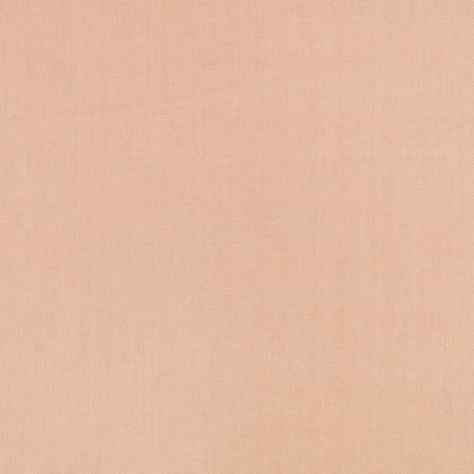 Close-up of soft peach-pink plain weave with delicate, matte crossgrain