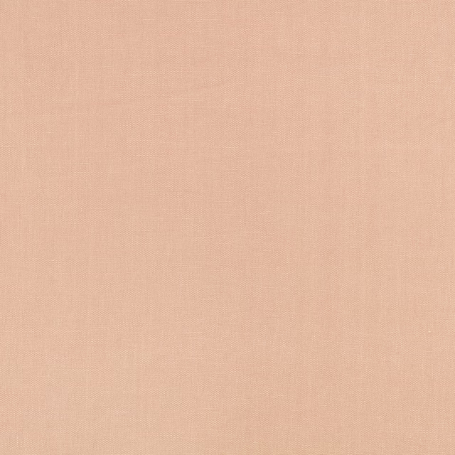 Close-up of soft peach-pink plain weave with delicate, matte crossgrain