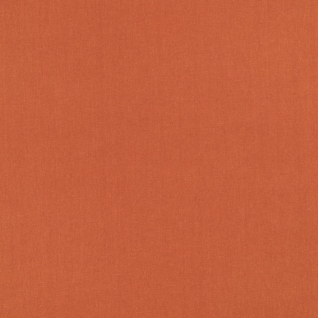 Warm rust-orange plain weave with subtle fine crosshatched surface texture