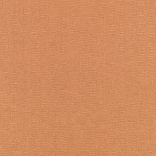 Warm sweet-potato terracotta fabric with a fine, subtly textured plain weave