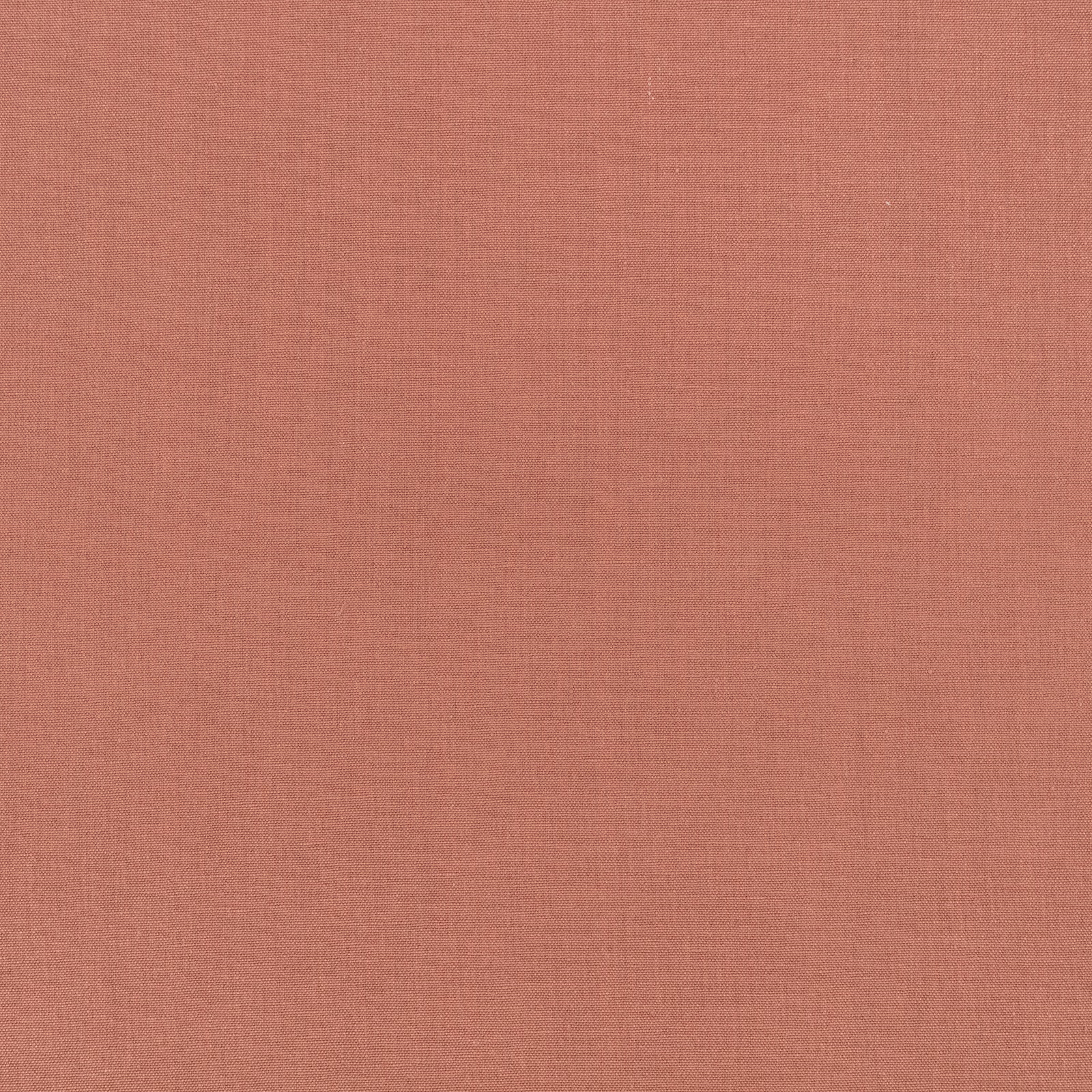 Close-up of muted vintage rose fabric with a fine, softly textured plain weave