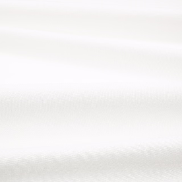 Near-white fabric with delicate horizontal tonal weave and softly textured surface