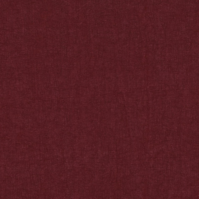 Deep ruby red woven fabric with subtle burgundy tonal variation and fine texture