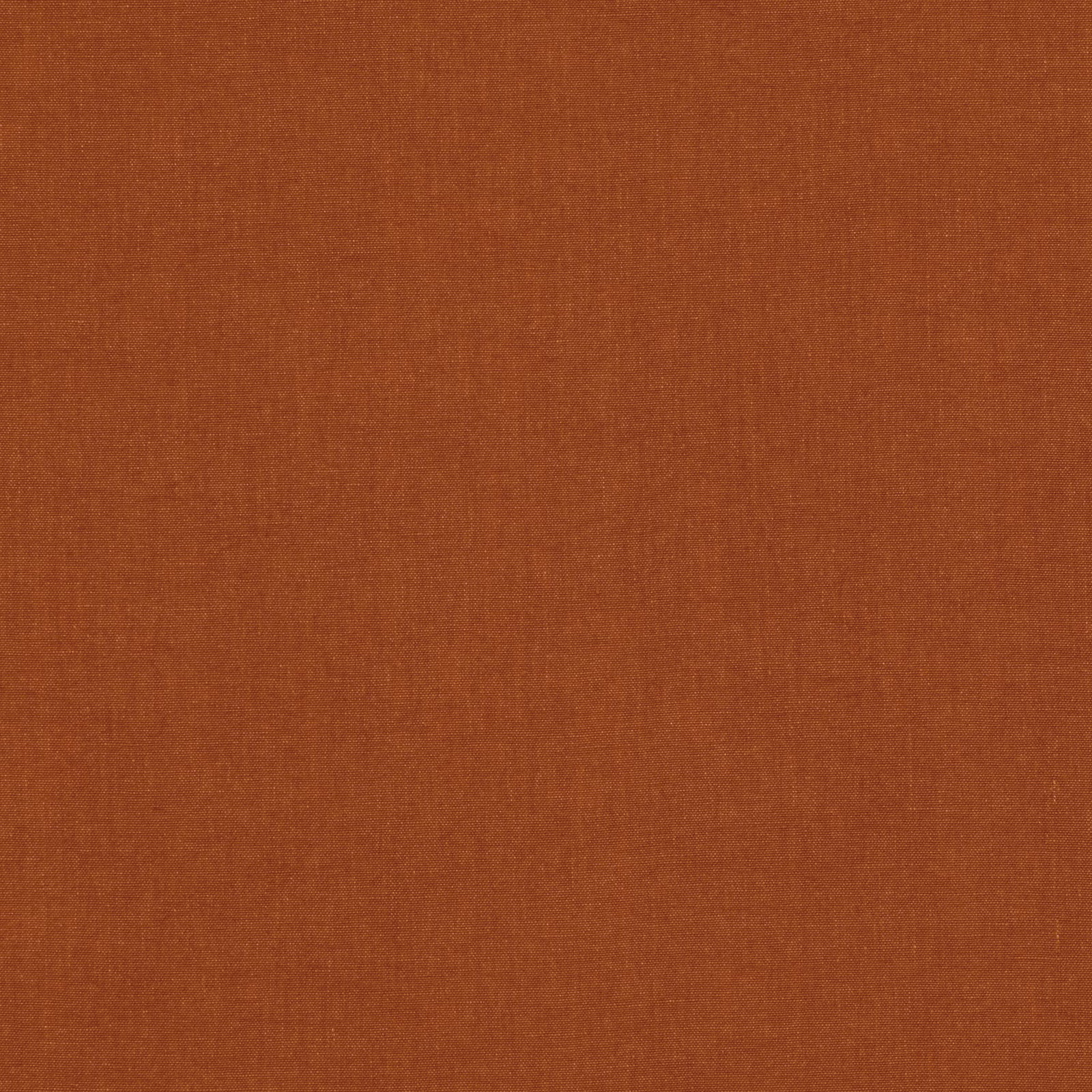 Close-up of warm burnt terracotta fabric with a fine, subtly textured plain weave