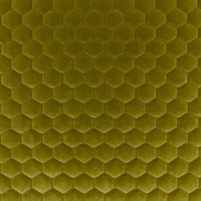 Moss olive-green plush textile with a raised, repeating hexagonal honeycomb surface