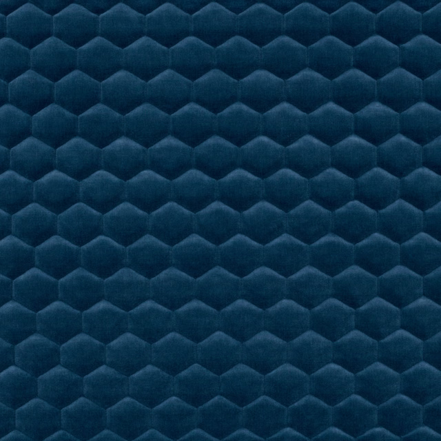 Deep kingfisher-blue teal fabric with rows of softly faceted, plush scale motifs