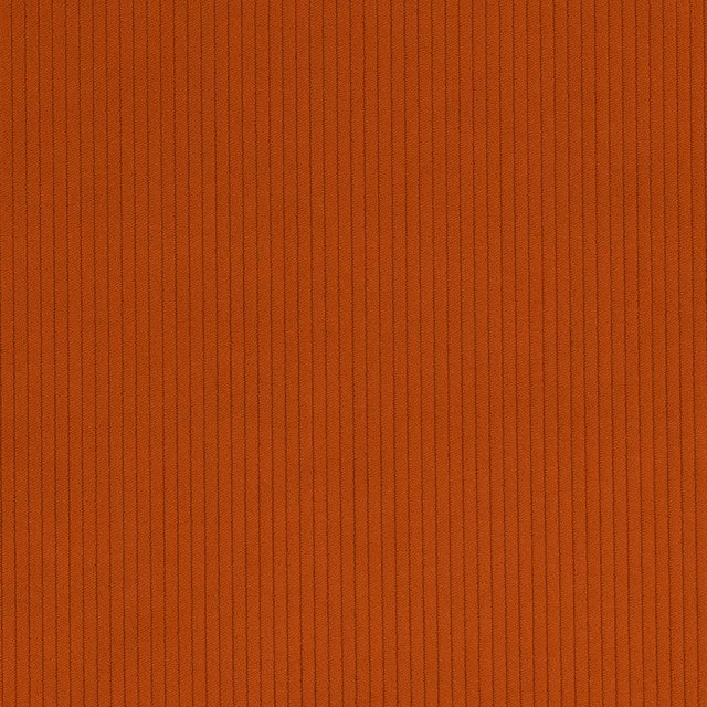 Warm cinnamon-orange cord fabric with fine vertical ribs and subtle shadowed texture