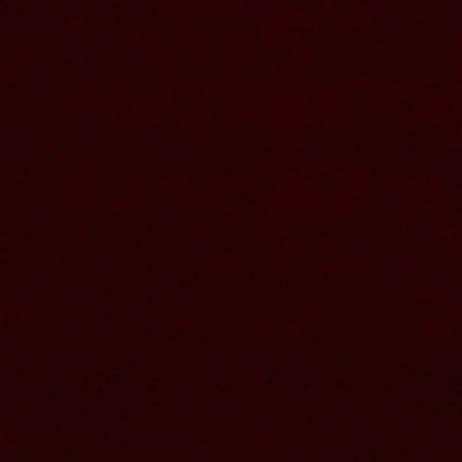 Near-black claret-red swatch with a barely visible, softly textured surface