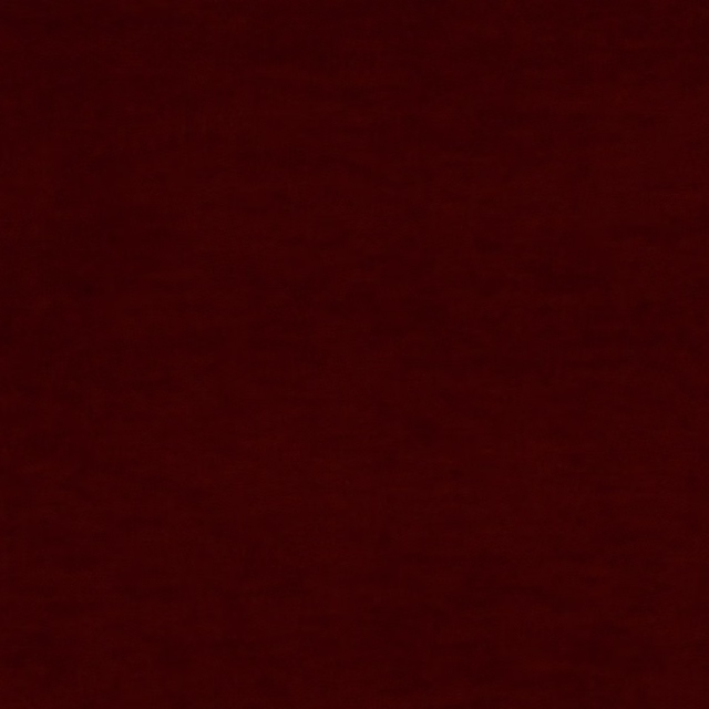 Deep paprika-red textile with a shadowed, subtly lustrous surface and fine nap