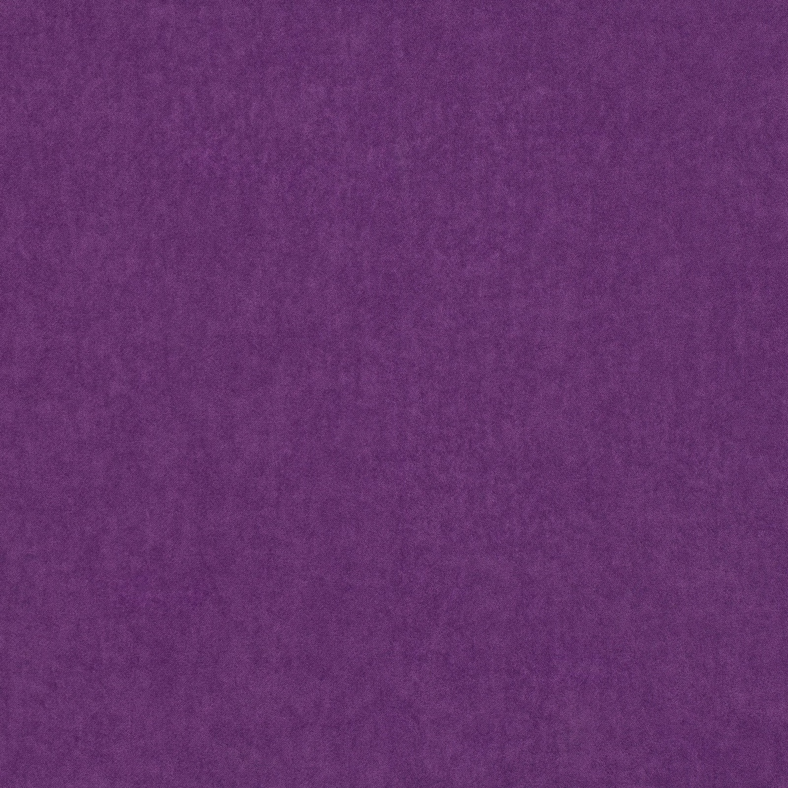 Close-up of richly shaded violet fabric with a softly mottled, brushed-looking surface