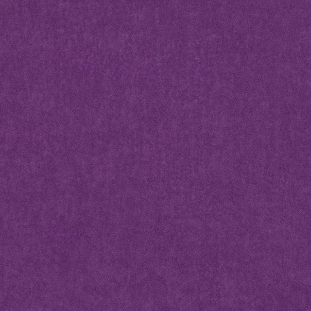 Close-up of richly shaded violet fabric with a softly mottled, brushed-looking surface