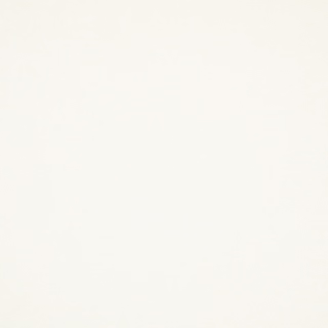 Pale ivory cream fabric swatch with a barely visible, smooth woven surface