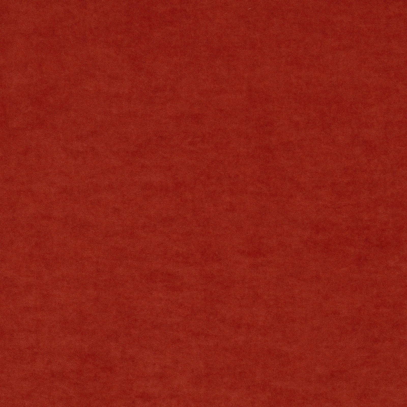 Deep flame-red fabric with subtle tonal mottling across its soft-looking plain surface
