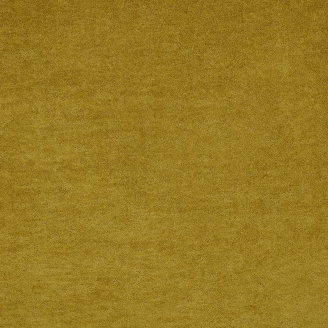 Close-up of warm mustard fabric with a soft, finely mottled pile