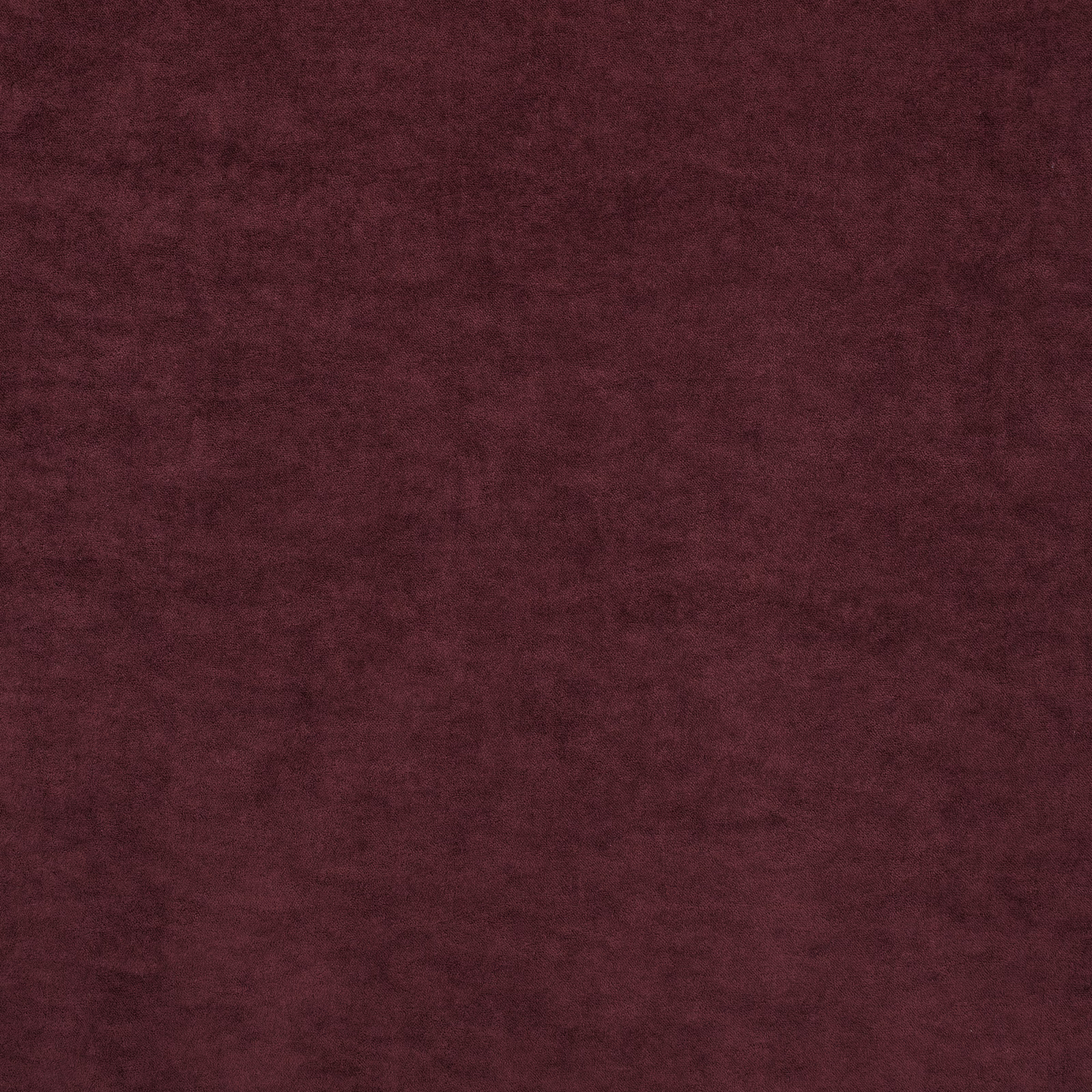 Deep plum fabric swatch with a softly mottled, velvety tonal surface