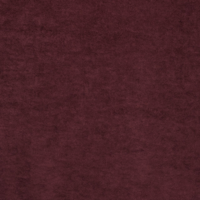 Deep plum fabric swatch with a softly mottled, velvety tonal surface