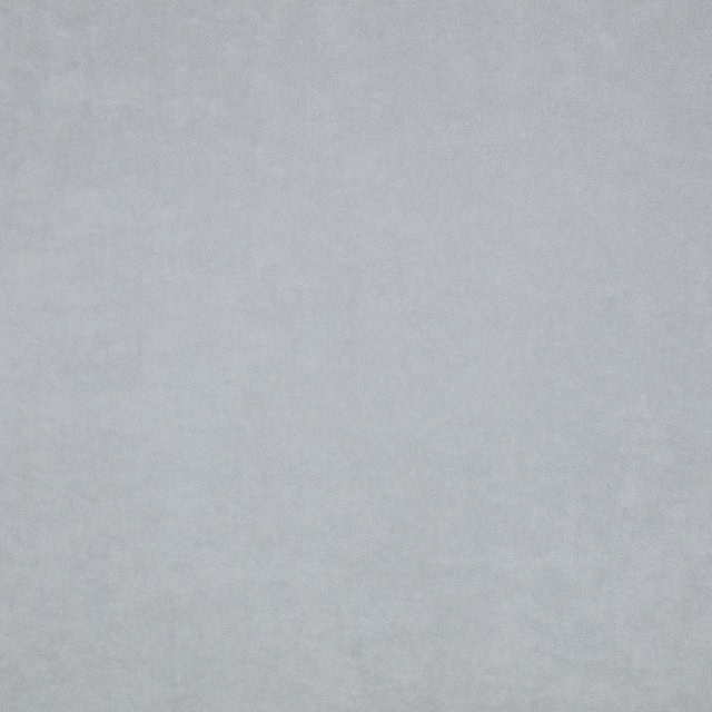 Cool silver-grey fabric with a faint cloudy texture and softly woven surface