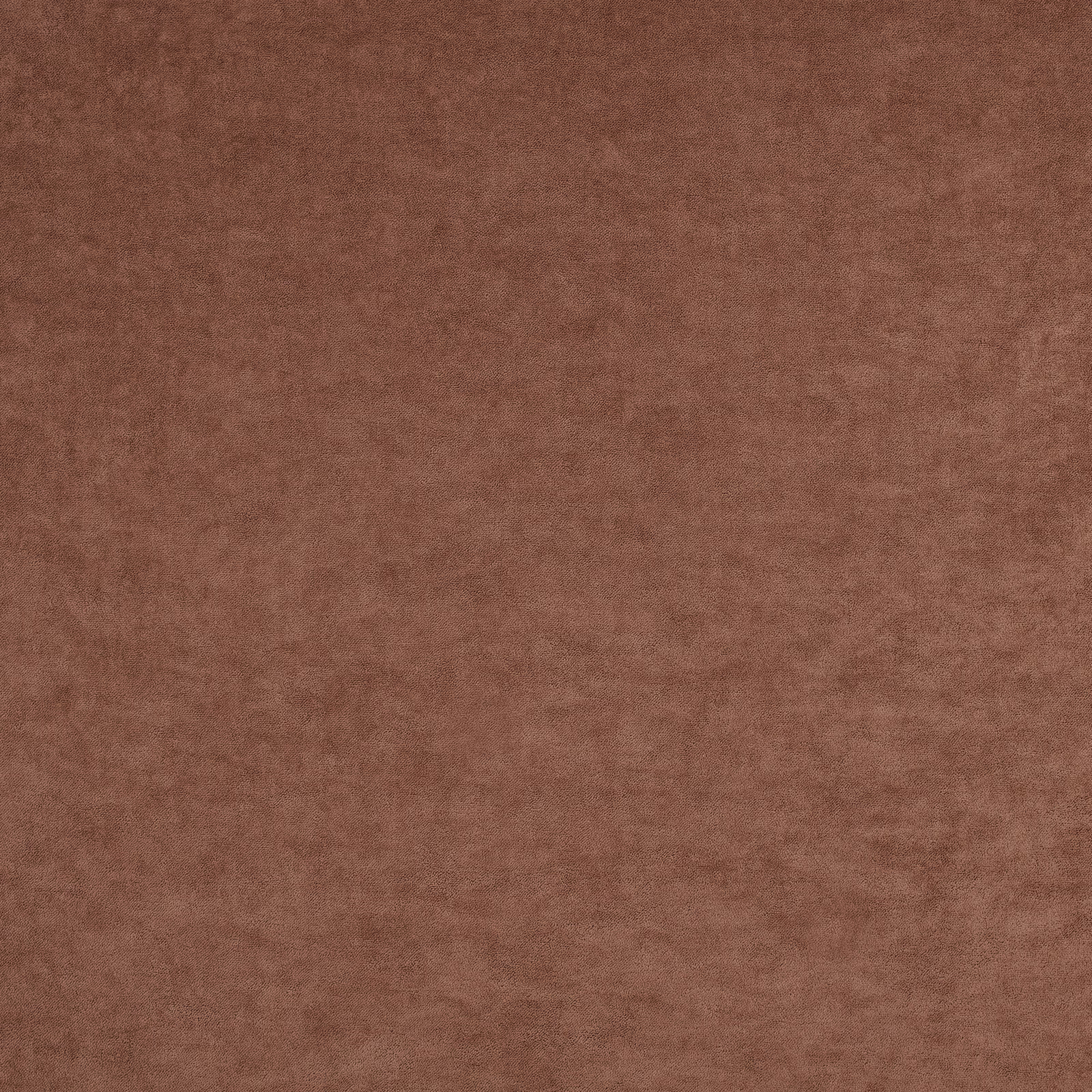 Warm vintage rose fabric with a softly mottled, plush surface