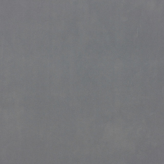 Muted smoke-blue suede-textured fabric with subtle grey tonal variation