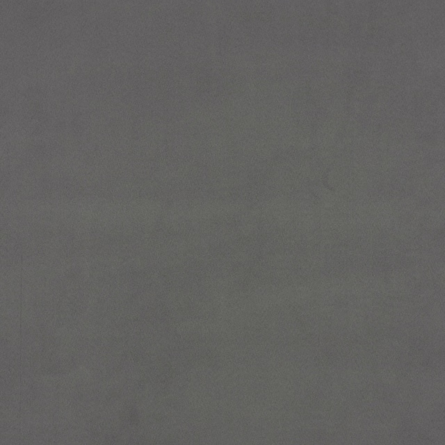 Close-up of cool steel-grey suede fabric with subtle mottled nap