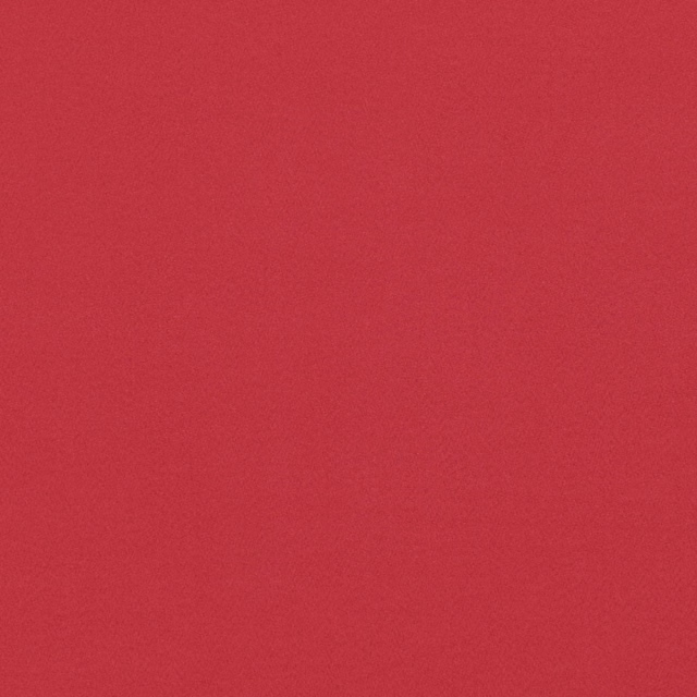 Close-up of chilli-red suede with a soft, finely grained matte surface