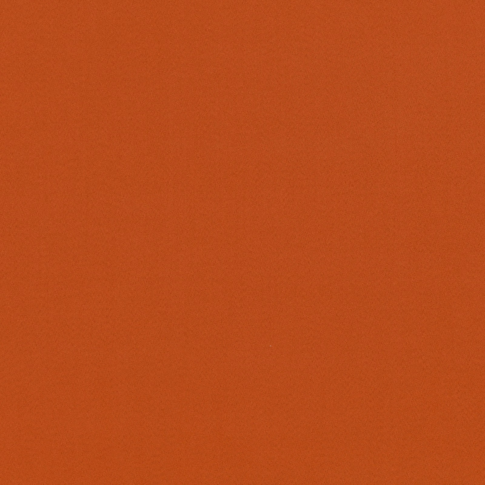 Close-up of warm burnt-orange suede-textured plain fabric with subtle tonal nap