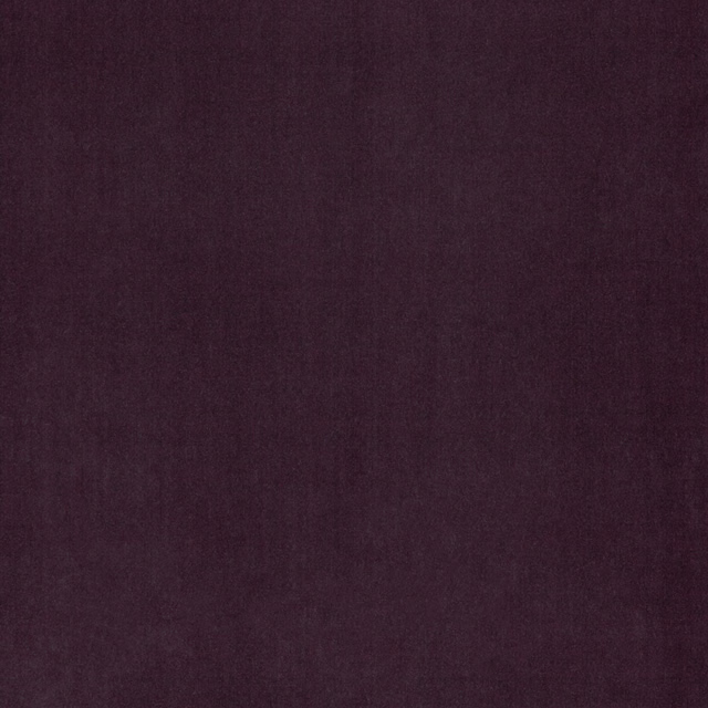 Deep plum upholstery fabric with a softly mottled, subtly textured surface