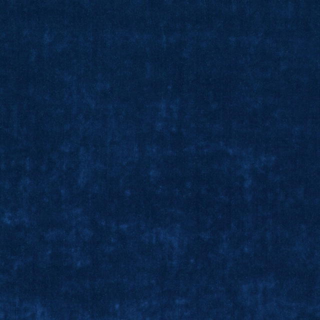 Deep sapphire blue textile swatch with softly mottled, plush-looking surface
