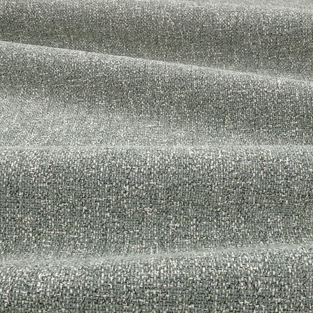 Muted aloe grey-green woven fabric with fine flecked texture and soft raised ridges
