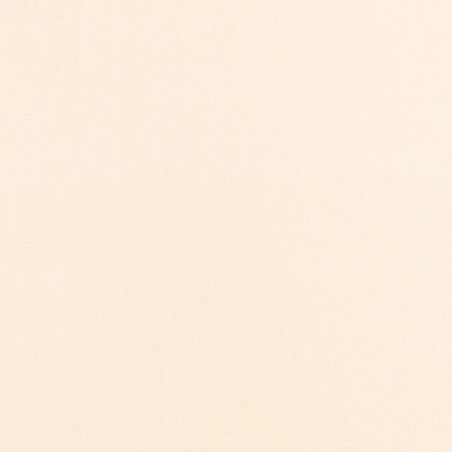Warm ivory Flax Calico fabric showing a fine, softly textured plain weave