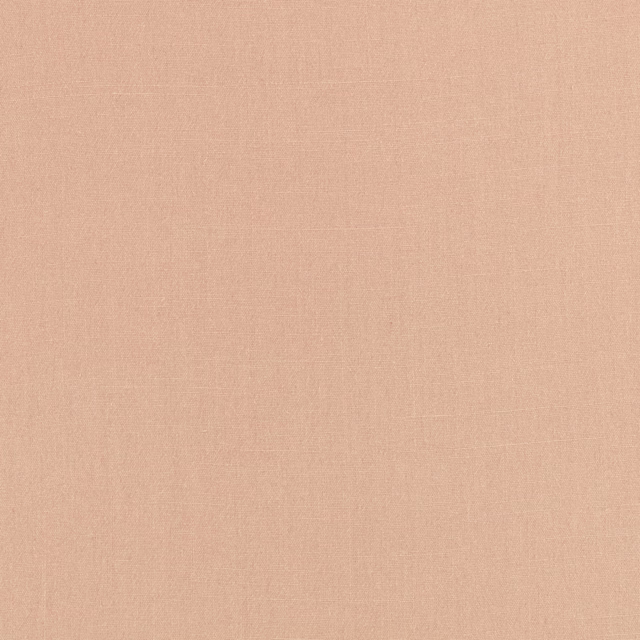 Warm blush-pink plain weave with a subtly crosshatched, plaster-like surface
