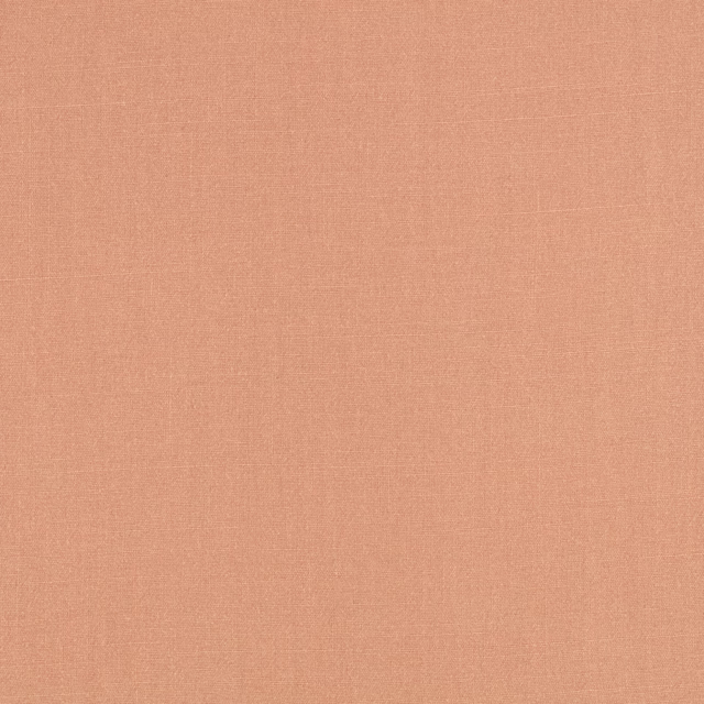 Dusty pink-sand plain weave with subtle crosshatched texture and warm salmon undertones
