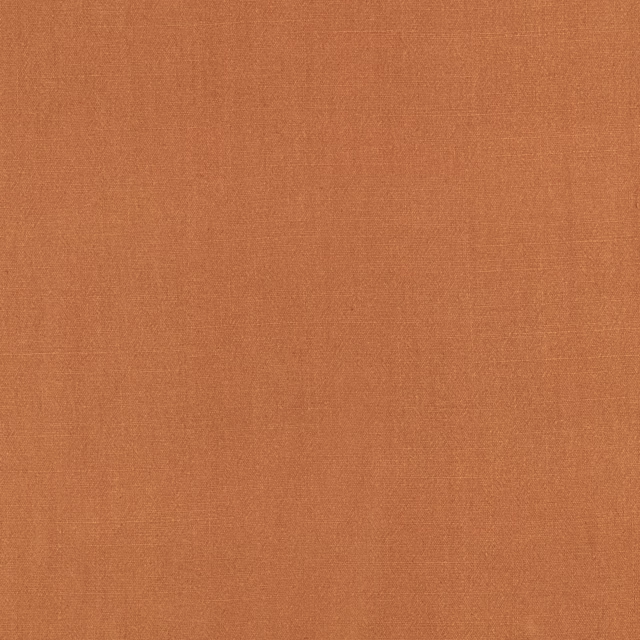 Warm burnt terracotta plain weave with subtle horizontal and vertical texture