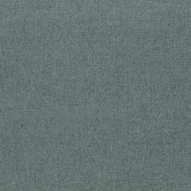 Close-up of muted balsam green woven fabric with fine tonal flecks