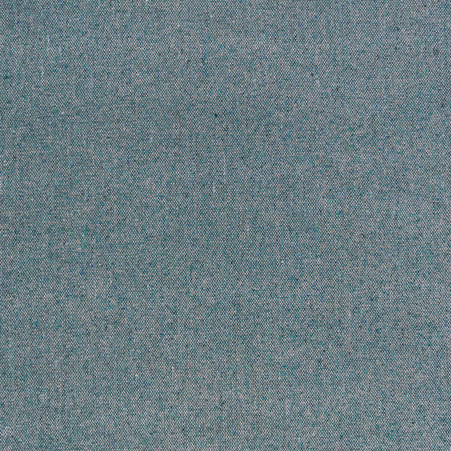 Close-up of muted teal upholstery weave with blue-grey flecks and fine texture
