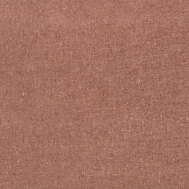 Warm clay-brown woven ground with fine pale flecks and subtle texture