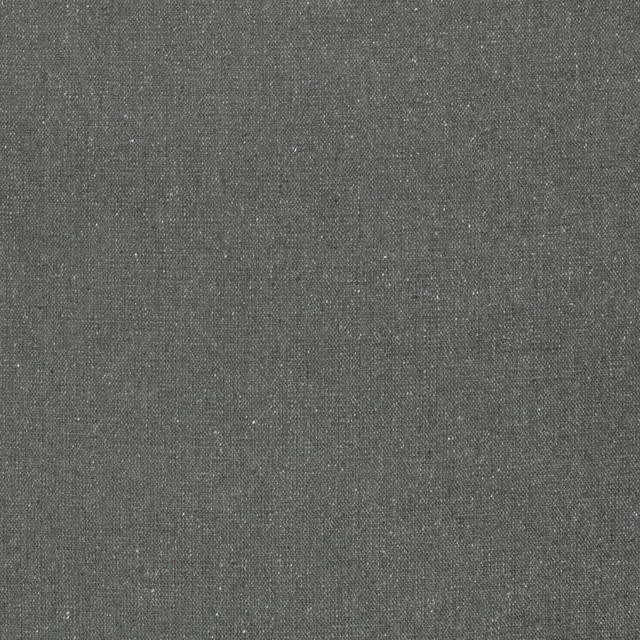 Close-up of charcoal-grey woven fabric with fine pale flecks and tactile grain