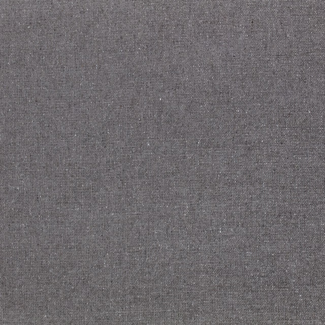 Close-up of graphite-grey woven fabric with fine pale flecks and subtle tonal texture