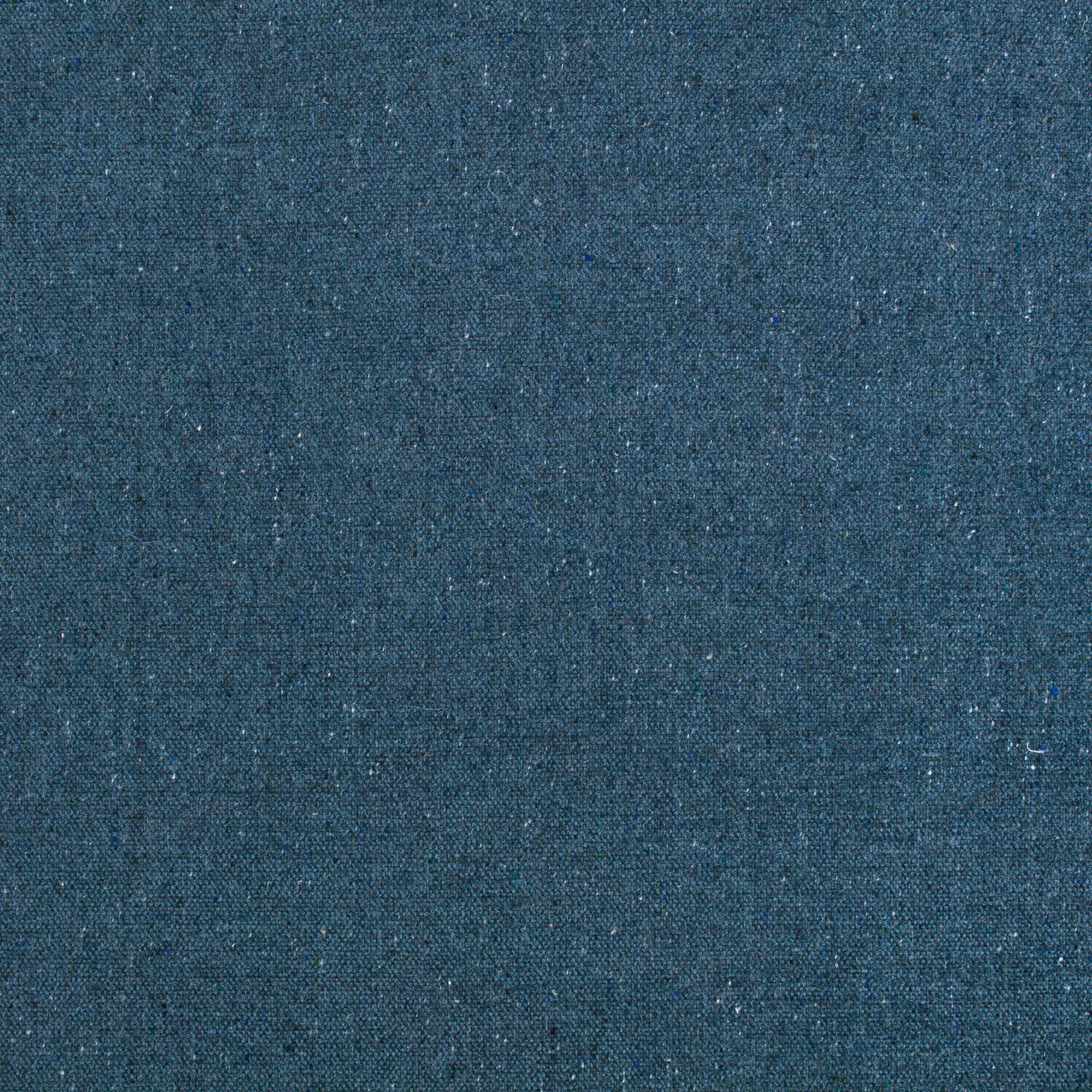 Close-up of deep petrol blue woven fabric with subtle flecked texture